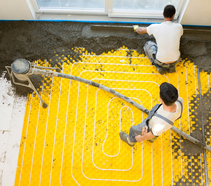 Installing underfloor heating and cooling pipes modern system