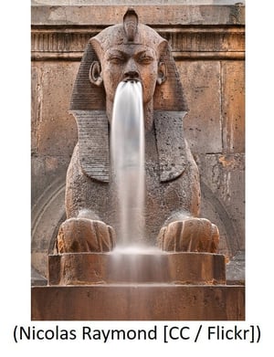 Long exposure photo of a fountain sphinx from Paris, France.